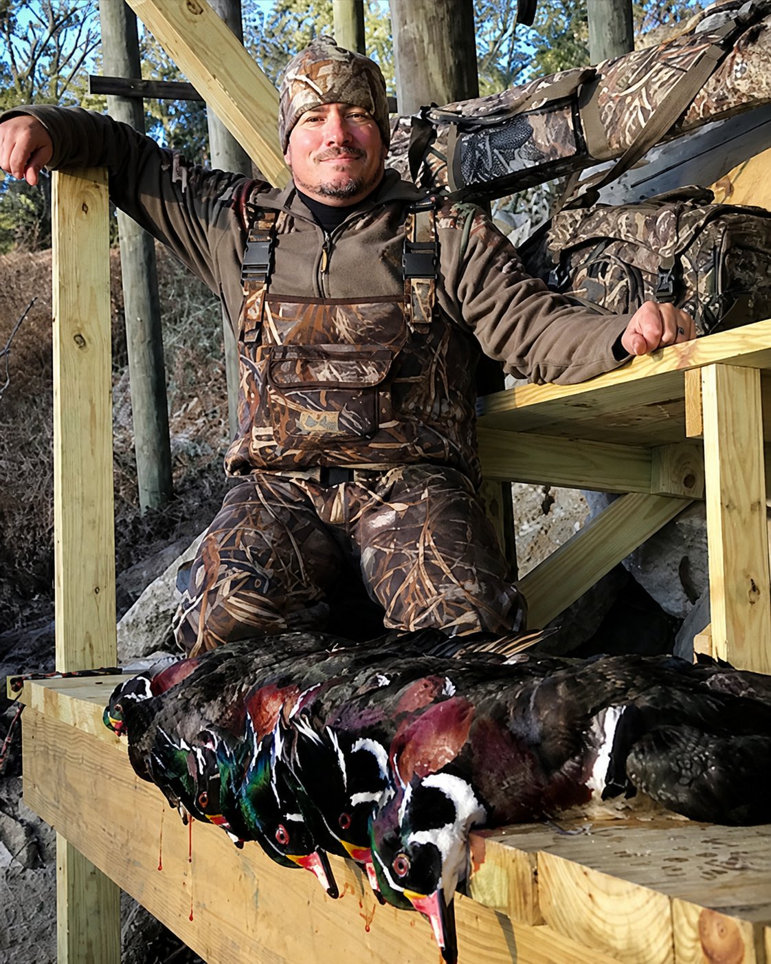 Ashley Brown with ducks after a successful hunt